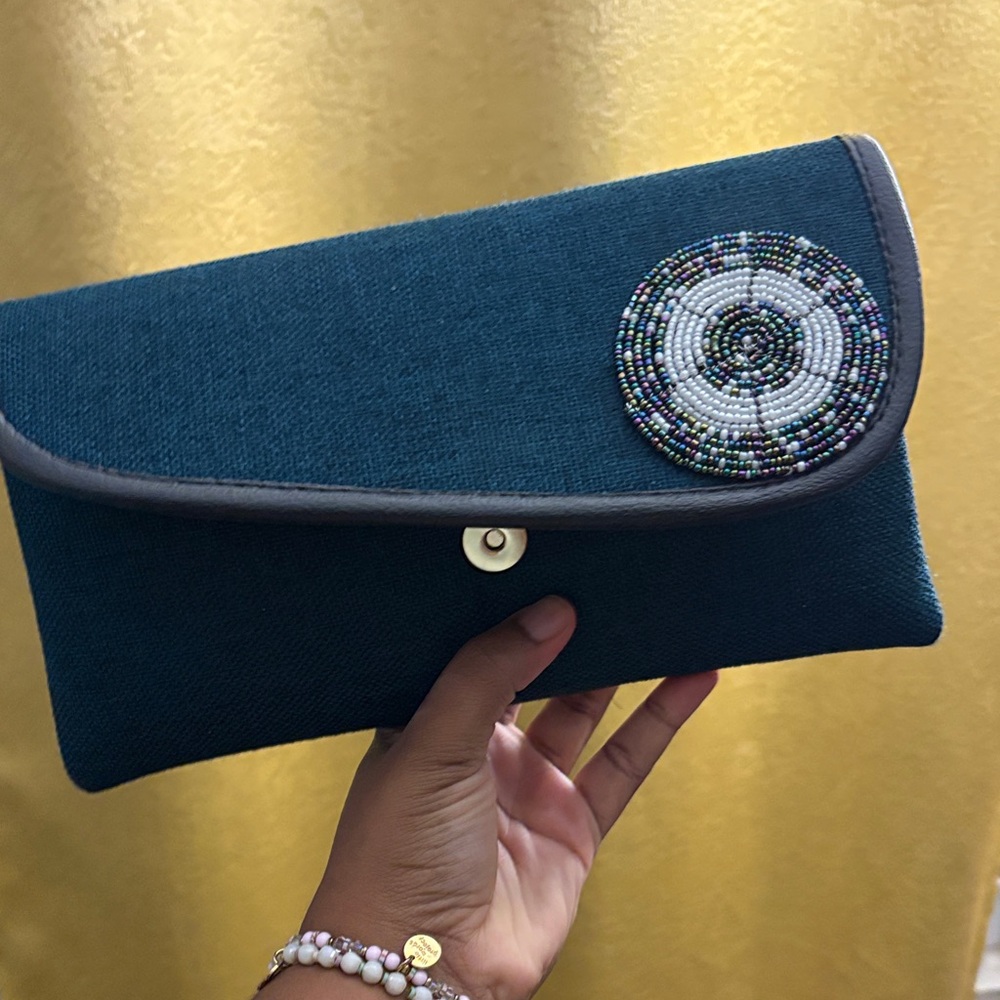 Elegant Teal Clutch with Beaded Accent